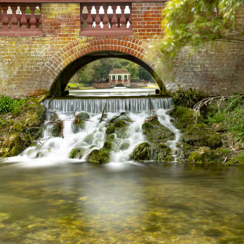 A photo of the water flowing through Russell Gardens Pond