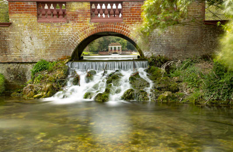 A photo of the water flowing through Russell Gardens Pond