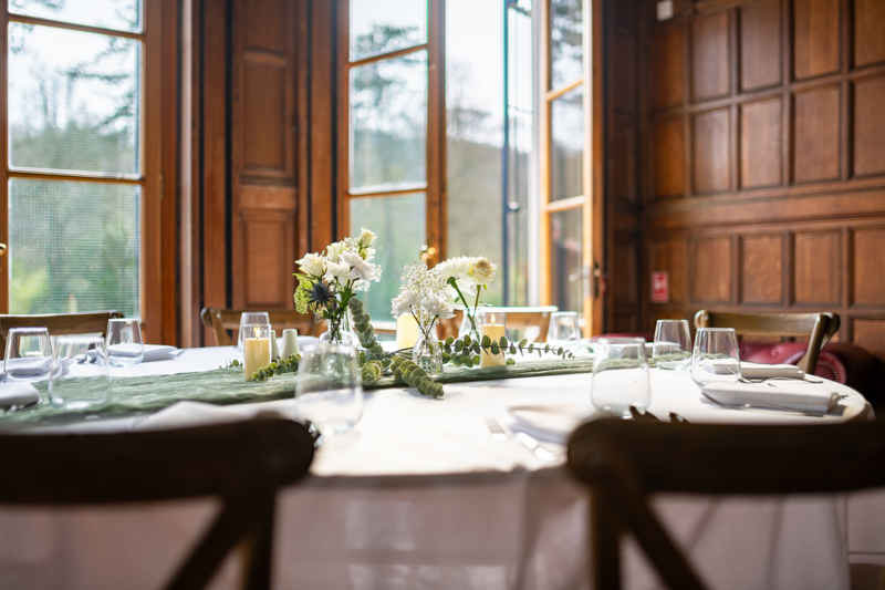 Billiards Room with table cloth  and flowers